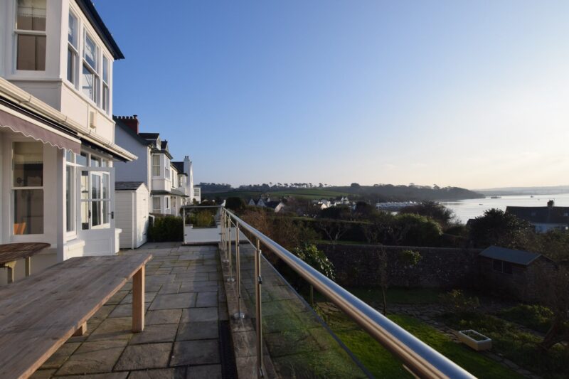 View from the terrace over the private garden and across the estuary